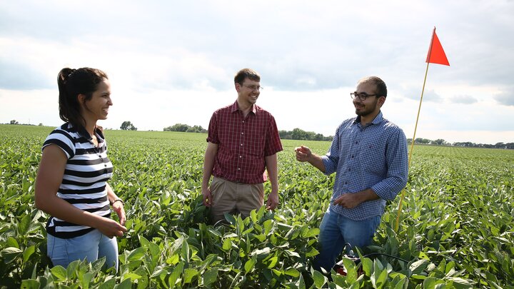 University of Nebraska–Lincoln student researchers Bella Possignolo (left) and Sandeep Bhatti (right) conduct fieldwork with DWFI Faculty Fellow and Nebraska irrigation engineer Derek Heeren.