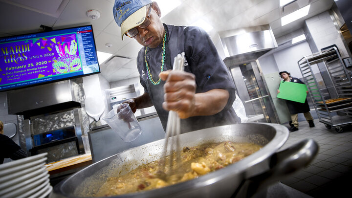 White, who is from New Orleans, prepares his family's traditional Louisiana recipes for the annual event.