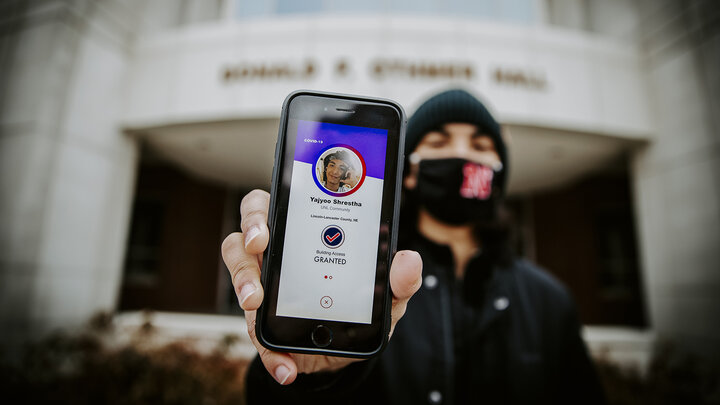 Nebraska’s Yajvoo Shrestha shows the Safer Community app to be used as part of COVID testing on campus this spring.