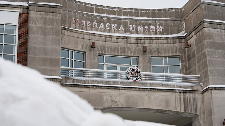 The north façade of the Nebraska Union is covered in snow after wintery conditions arrived in Lincoln during the Dec. 12-13 weekend.