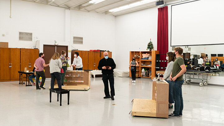 Nebraska's William Shomos (center) plays Mr. Maraczek during a rehearsal for “She Loves Me.”