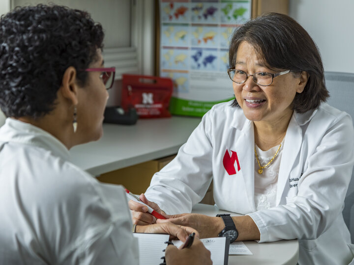 doctor helping person
