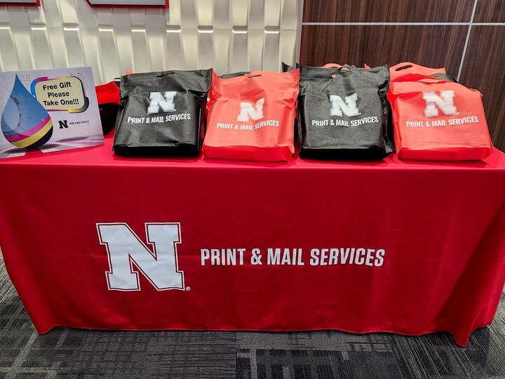 Printing services booth with bags